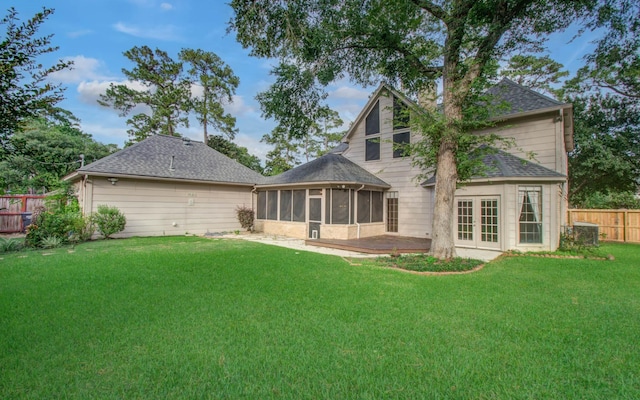 5810 Springton Ln, Spring, TX 77379 - back of house with a sunroom, french doors, roof with shingles, and central air condition unit