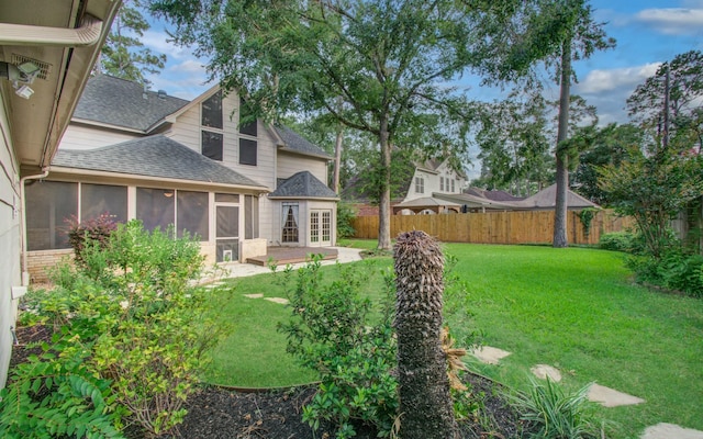 5810 Springton Ln, Spring, TX 77379 - view of yard featuring a sunroom and french doors