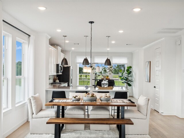 2020 Groveland Glen Dr, Houston, TX 77051 - dining space featuring light wood-style floors, baseboards, and recessed lighting