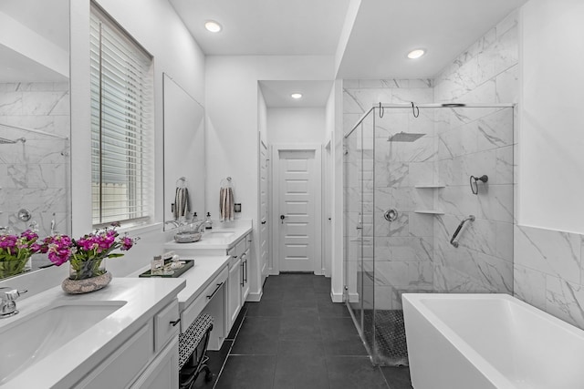 4818 Nodding Thistle Trl, Fulshear, TX 77441 - full bath featuring double vanity, a stall shower, a freestanding tub, recessed lighting, and tile patterned flooring