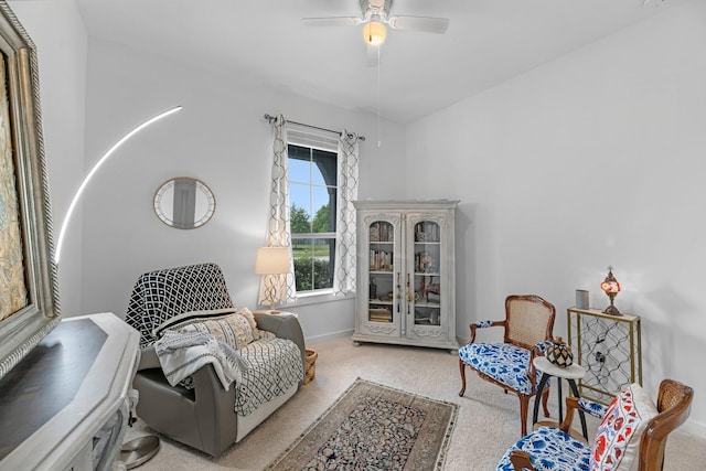 4818 Nodding Thistle Trl, Fulshear, TX 77441 - living area with carpet floors, a ceiling fan, and baseboards