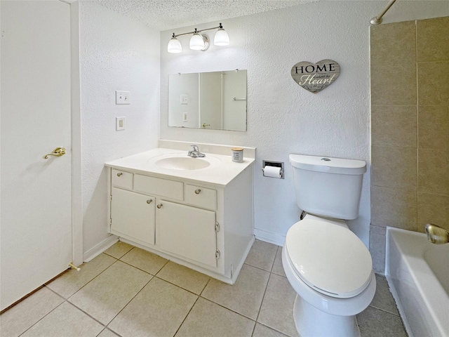 6328 W Airport Blvd Unit 6328, Houston, TX 77035 - bathroom with toilet, vanity, tile patterned floors, a textured ceiling, and shower / bath combination