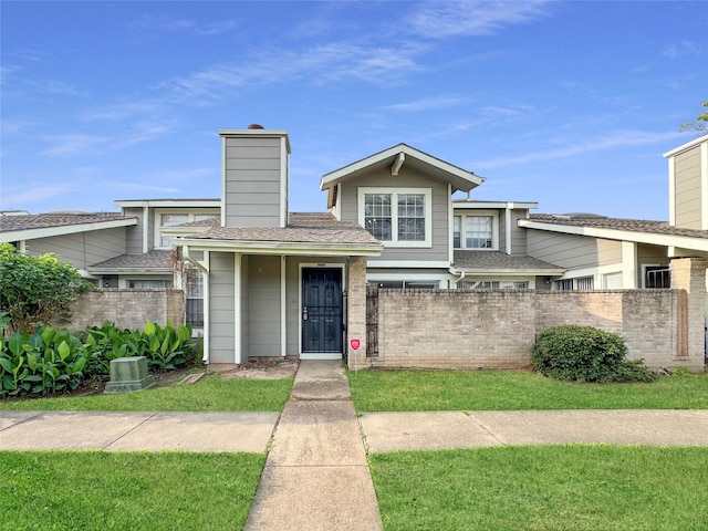 6328 W Airport Blvd Unit 6328, Houston, TX 77035 - view of front of house featuring a chimney