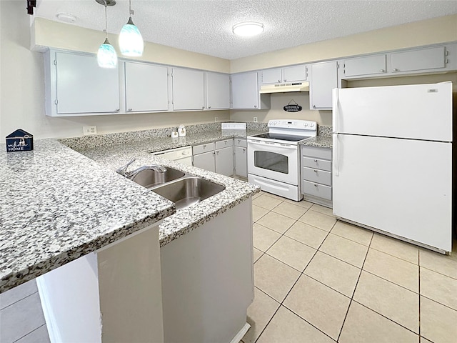 6328 W Airport Blvd Unit 6328, Houston, TX 77035 - kitchen with white appliances, under cabinet range hood, a sink, a peninsula, and pendant lighting
