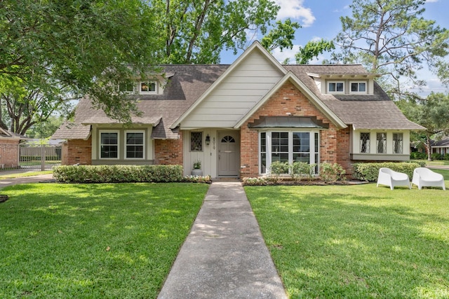 8019 Skyline Dr, Houston, TX 77063 - view of front of house featuring brick siding and roof with shingles