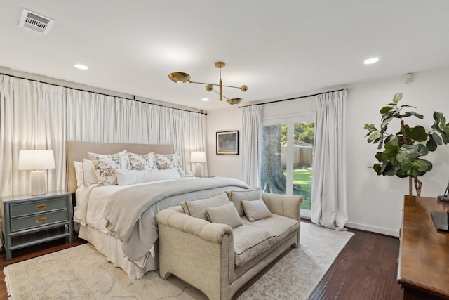 8019 Skyline Dr, Houston, TX 77063 - bedroom featuring a chandelier, wood finished floors, recessed lighting, and baseboards