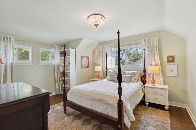 8019 Skyline Dr, Houston, TX 77063 - bedroom with dark wood-style floors, baseboards, and lofted ceiling