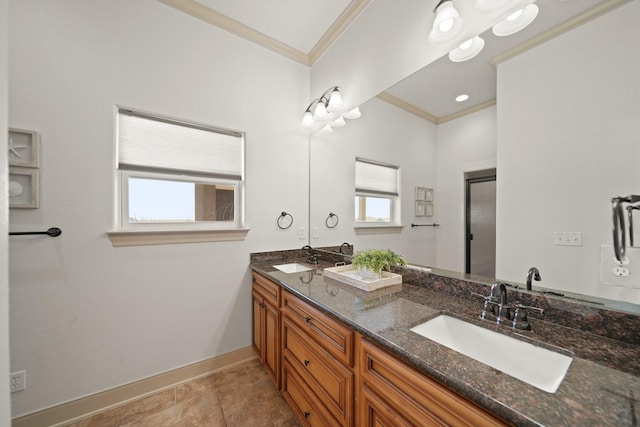 898 Mr G, Crystal Beach, TX 77650 - bathroom with ornamental molding, baseboards, and double vanity