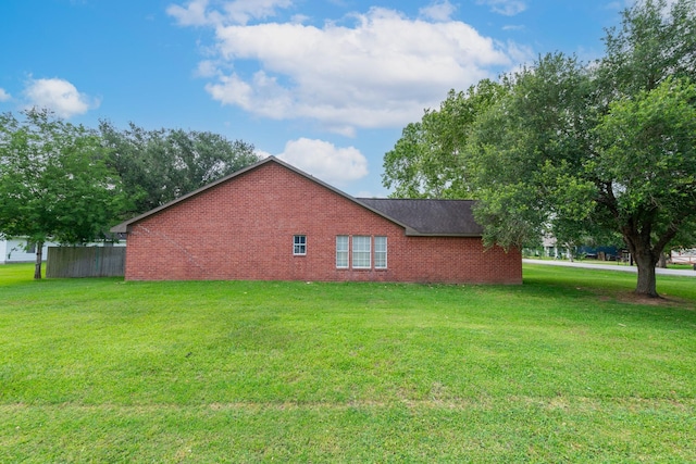 330 N 4th St, Beasley, TX 77417 - view of side of home featuring brick siding