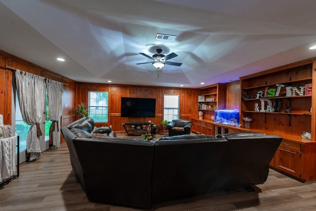 330 N 4th St, Beasley, TX 77417 - living room with wood walls, a ceiling fan, light wood finished floors, recessed lighting, and lofted ceiling