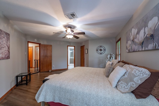 330 N 4th St, Beasley, TX 77417 - bedroom with wood finished floors and ceiling fan