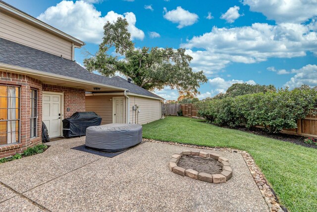 14102 N Suddley Castle St, Houston, TX 77095 - view of patio with a fire pit