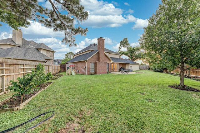 14102 N Suddley Castle St, Houston, TX 77095 - view of yard featuring a patio and a garden