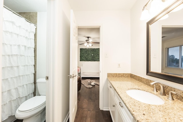 14102 N Suddley Castle St, Houston, TX 77095 - ensuite bathroom with wood finished floors, vanity, toilet, a shower with curtain, and ceiling fan