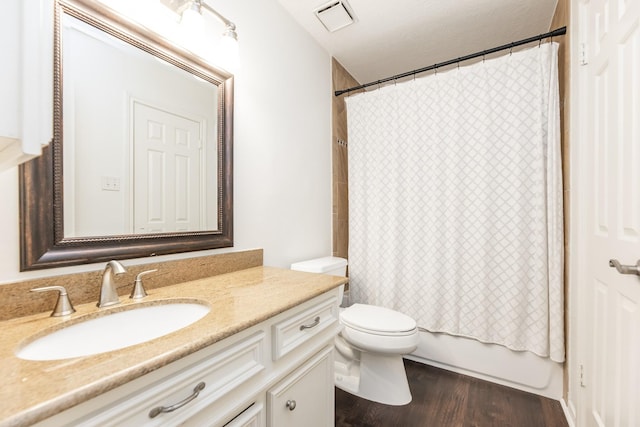 14102 N Suddley Castle St, Houston, TX 77095 - bathroom featuring vanity, toilet, wood finished floors, and shower / bath combo with shower curtain