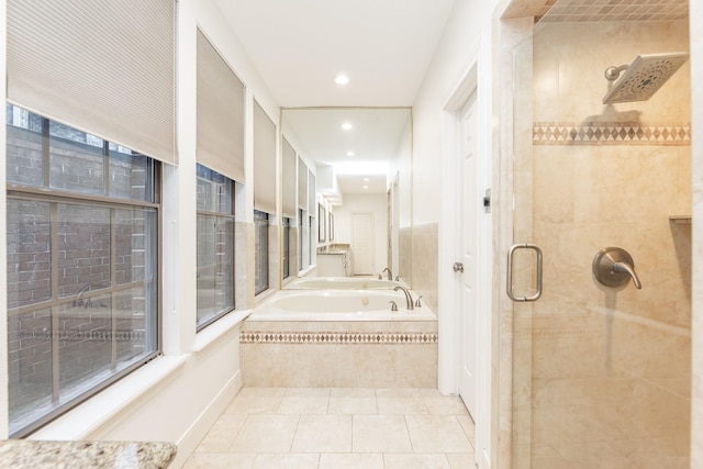 14102 N Suddley Castle St, Houston, TX 77095 - bathroom featuring a shower stall, a bath, tile patterned flooring, and recessed lighting