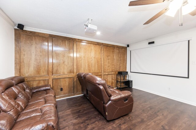 14102 N Suddley Castle St, Houston, TX 77095 - home theater with dark wood finished floors, ornamental molding, a ceiling fan, and baseboards