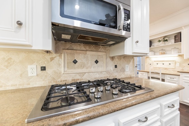 14102 N Suddley Castle St, Houston, TX 77095 - kitchen with appliances with stainless steel finishes, white cabinets, ornamental molding, backsplash, and open shelves