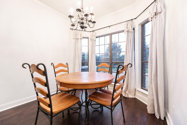 14102 N Suddley Castle St, Houston, TX 77095 - dining space with ornamental molding, a chandelier, dark wood-style flooring, and baseboards