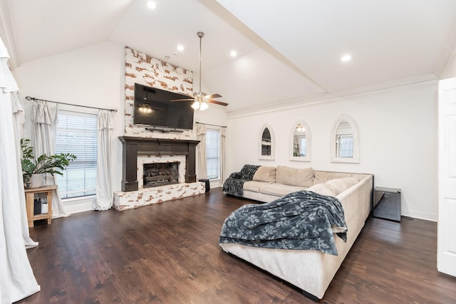 14102 N Suddley Castle St, Houston, TX 77095 - living room with ceiling fan, a fireplace with raised hearth, high vaulted ceiling, wood finished floors, and baseboards