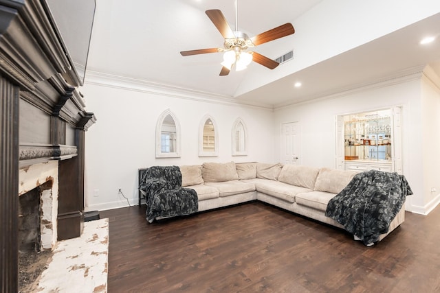 14102 N Suddley Castle St, Houston, TX 77095 - living room with lofted ceiling, a ceiling fan, a fireplace with raised hearth, dark wood finished floors, and crown molding