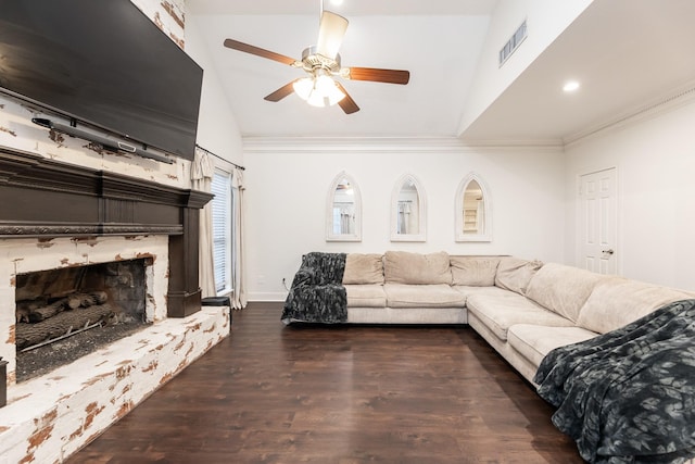 14102 N Suddley Castle St, Houston, TX 77095 - living area featuring lofted ceiling, a ceiling fan, crown molding, dark wood-style flooring, and a fireplace with raised hearth