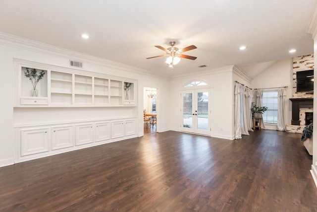 14102 N Suddley Castle St, Houston, TX 77095 - unfurnished living room featuring french doors, ceiling fan, a fireplace, dark wood finished floors, and crown molding