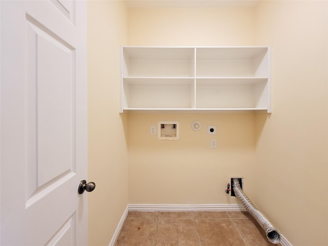 5307 Barleycorn Ln, Katy, TX 77494 - laundry area with gas dryer hookup, electric dryer hookup, hookup for a washing machine, baseboards, and tile patterned flooring