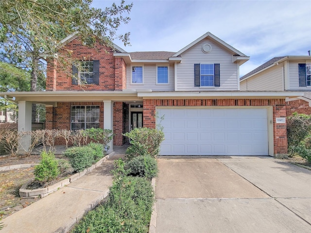 5307 Barleycorn Ln, Katy, TX 77494 - view of front of property with brick siding, driveway, a garage, and a porch