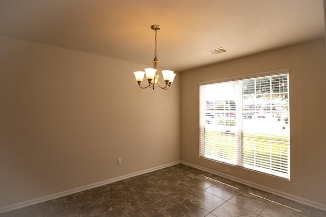 17907 Acorn Field Trl, Humble, TX 77346 - unfurnished room with a chandelier and baseboards