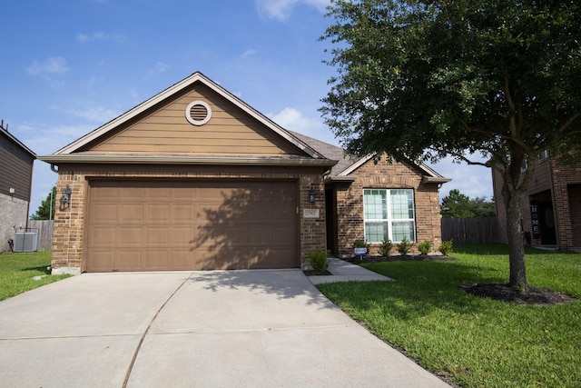 17907 Acorn Field Trl, Humble, TX 77346 - ranch-style house with cooling unit, concrete driveway, brick siding, and a garage