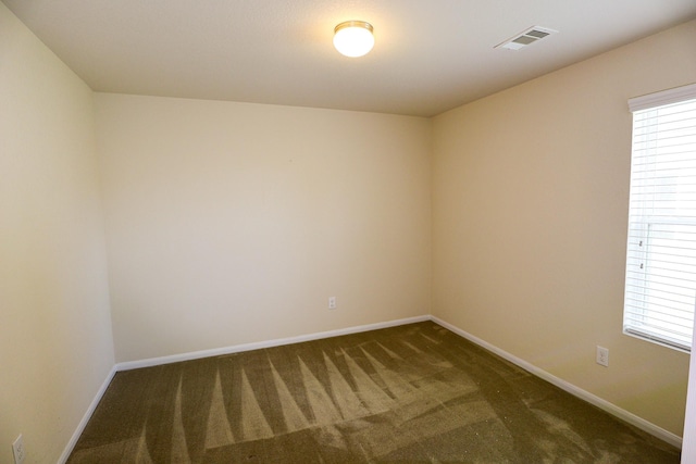 17907 Acorn Field Trl, Humble, TX 77346 - empty room with dark carpet and baseboards