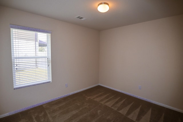 17907 Acorn Field Trl, Humble, TX 77346 - empty room featuring dark carpet and baseboards