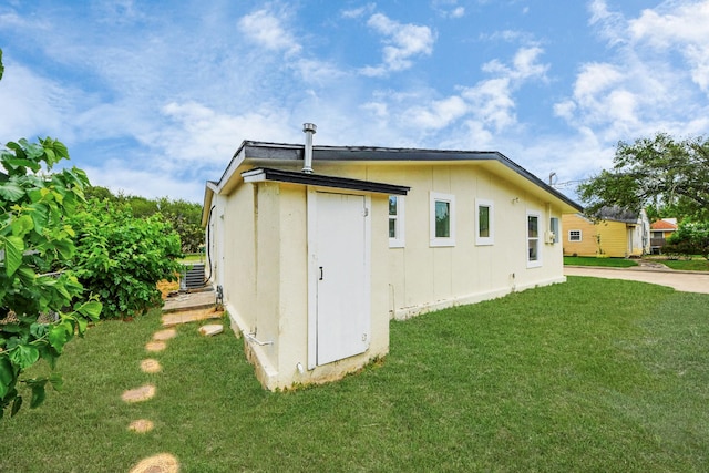 501 Schilling St, Baytown, TX 77520 - rear view of property featuring a yard and cooling unit