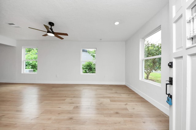 501 Schilling St, Baytown, TX 77520 - unfurnished room with light wood-style flooring, ceiling fan, baseboards, and recessed lighting