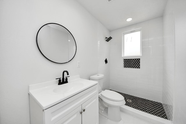 501 Schilling St, Baytown, TX 77520 - full bath with tiled shower, vanity, and toilet