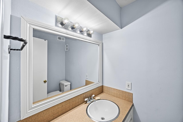 811 Lovett Blvd Unit 8, Houston, TX 77006 - half bathroom with vanity and toilet