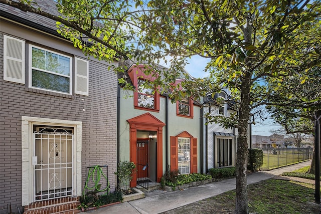 811 Lovett Blvd Unit 8, Houston, TX 77006 - view of front of property featuring brick siding and stucco siding