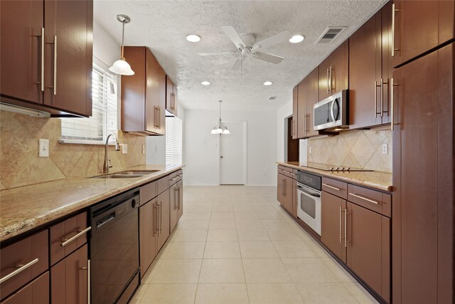 12839 Aste Ln, Houston, TX 77065 - kitchen featuring black appliances, a sink, ceiling fan, baseboards, and decorative light fixtures