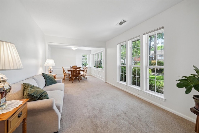 2055 Pine River Dr, Houston, TX 77339 - carpeted living room featuring baseboards
