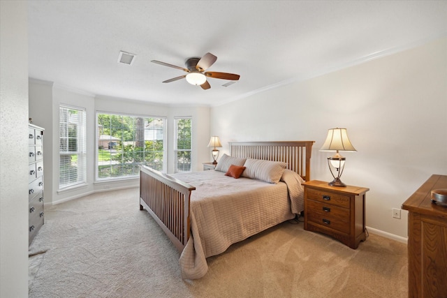 2055 Pine River Dr, Houston, TX 77339 - bedroom with carpet, ornamental molding, baseboards, and ceiling fan
