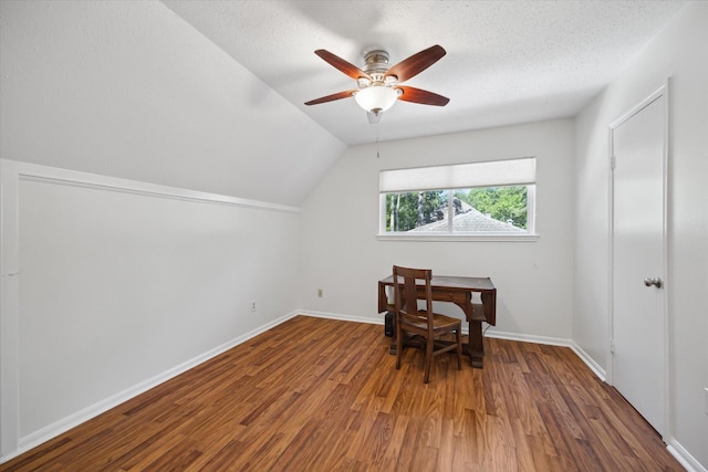 2055 Pine River Dr, Houston, TX 77339 - bonus room with wood finished floors, a ceiling fan, lofted ceiling, baseboards, and a textured ceiling