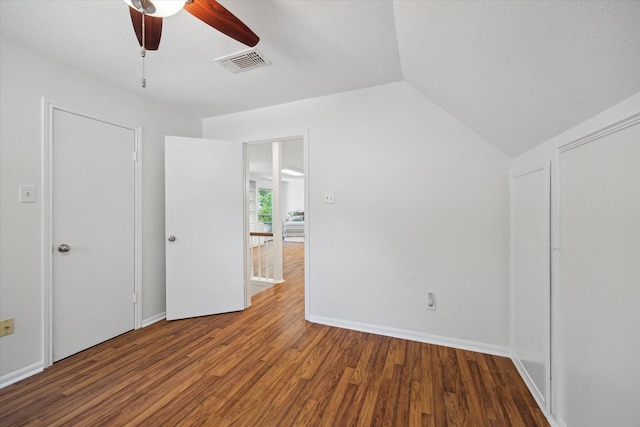 2055 Pine River Dr, Houston, TX 77339 - unfurnished bedroom featuring wood finished floors, vaulted ceiling, a ceiling fan, and baseboards