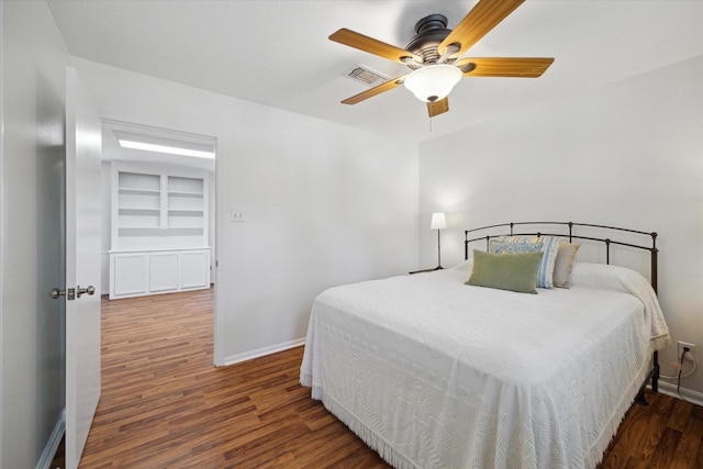 2055 Pine River Dr, Houston, TX 77339 - bedroom featuring wood finished floors, baseboards, and a ceiling fan