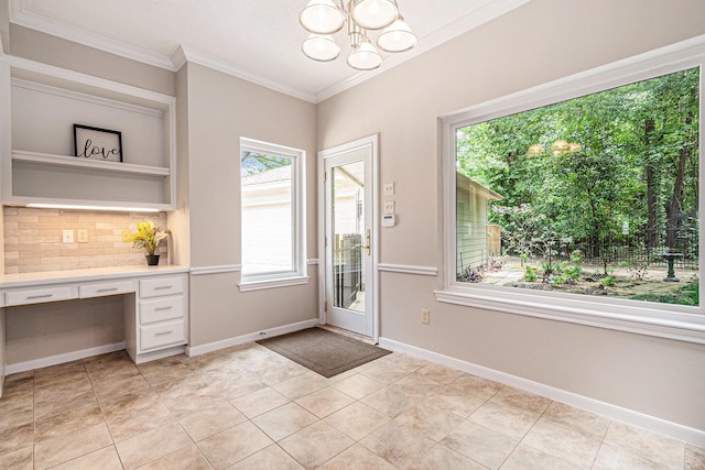 3506 Park Springs Ln, Houston, TX 77345 - doorway featuring crown molding, a chandelier, baseboards, and light tile patterned floors