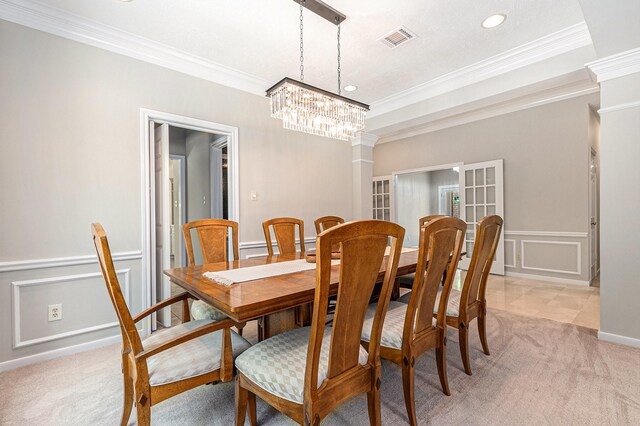 3506 Park Springs Ln, Houston, TX 77345 - dining room featuring light colored carpet, a decorative wall, a chandelier, ornamental molding, and recessed lighting