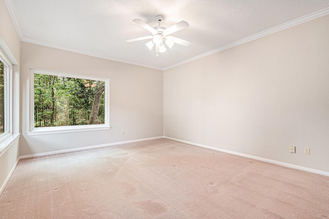 3506 Park Springs Ln, Houston, TX 77345 - unfurnished room featuring light carpet, ceiling fan, ornamental molding, baseboards, and a textured ceiling
