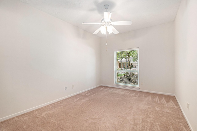 3506 Park Springs Ln, Houston, TX 77345 - spare room with light carpet, baseboards, and a ceiling fan