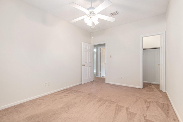 3506 Park Springs Ln, Houston, TX 77345 - unfurnished bedroom featuring light colored carpet, baseboards, a spacious closet, ceiling fan, and a closet