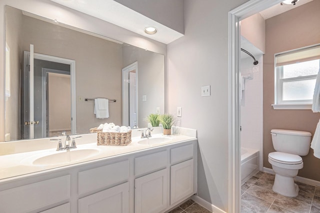 3506 Park Springs Ln, Houston, TX 77345 - full bath featuring double vanity, toilet, shower / tub combination, baseboards, and tile patterned flooring